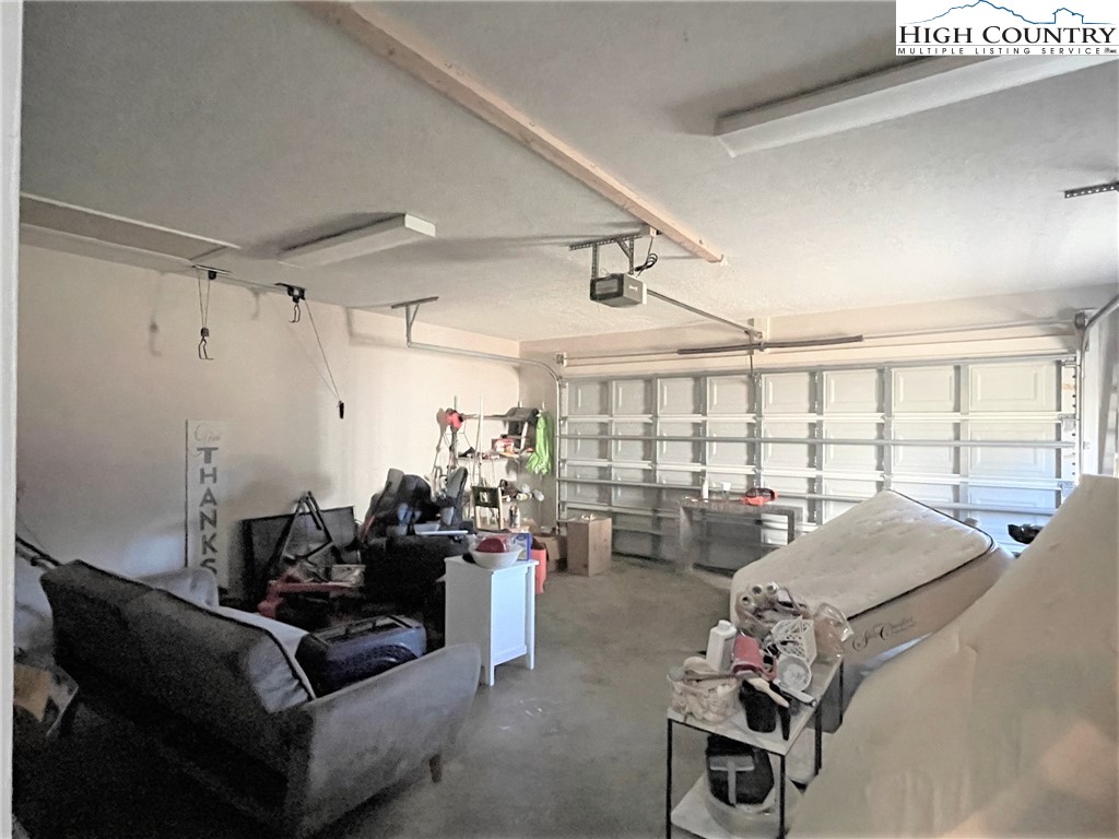 3490 Section House Road Hickory, NC 28601 - Photo 31 of 39 a living room with furniture and a large window