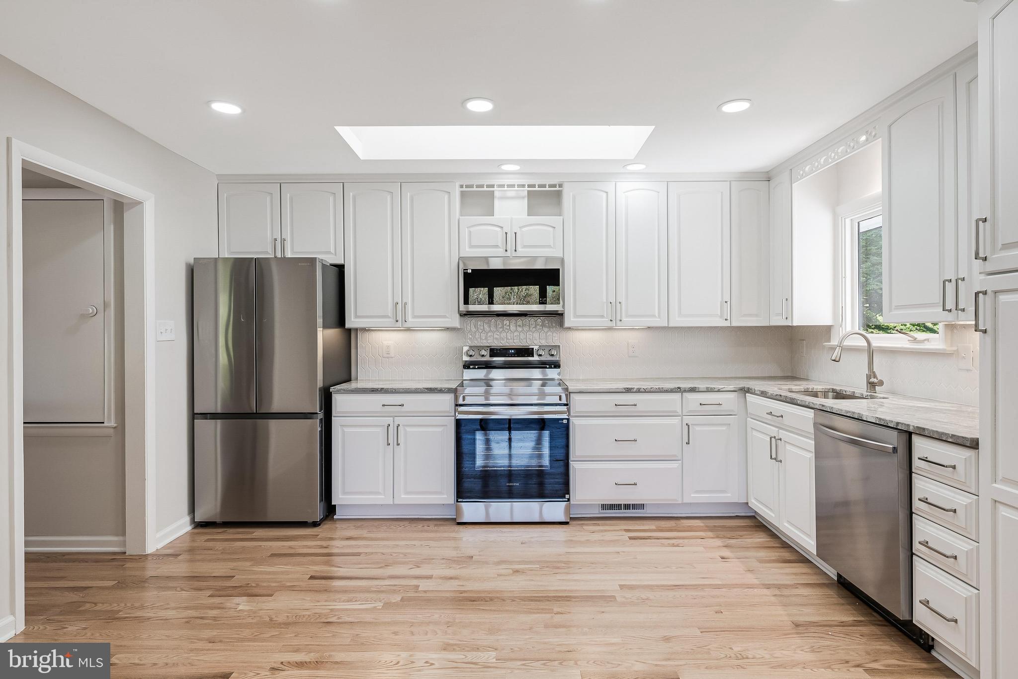 6891 Wilson Road Marshall, VA 20115 - Photo 59 of 118 Modern kitchen with sleek finishes.