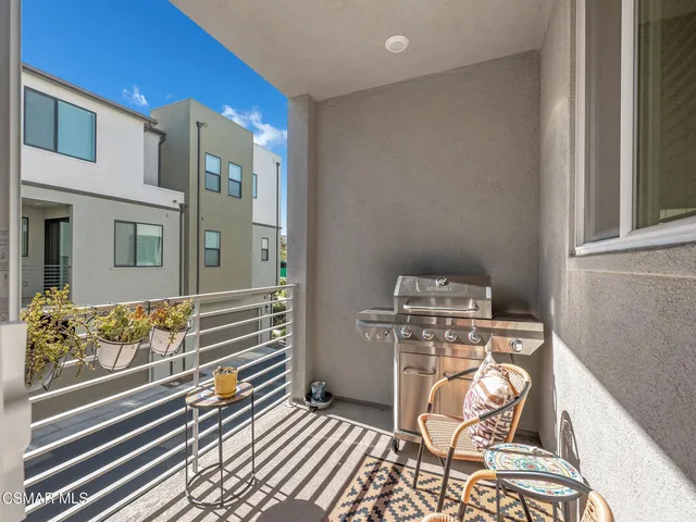 a room with furniture and a fireplace