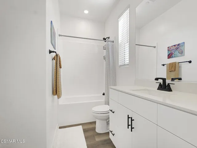 a front view of a house with windows