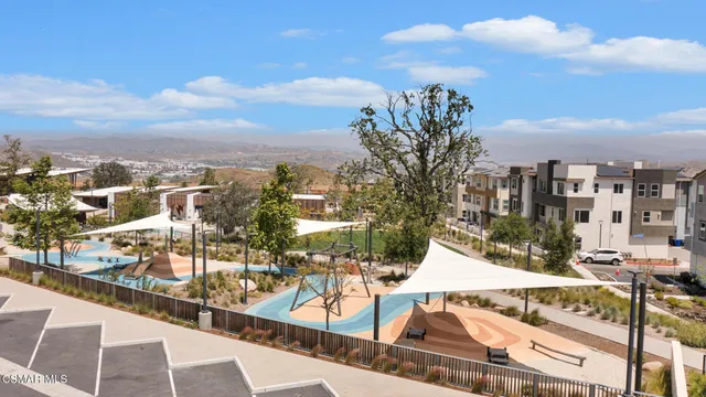 an aerial view of a house with a garden
