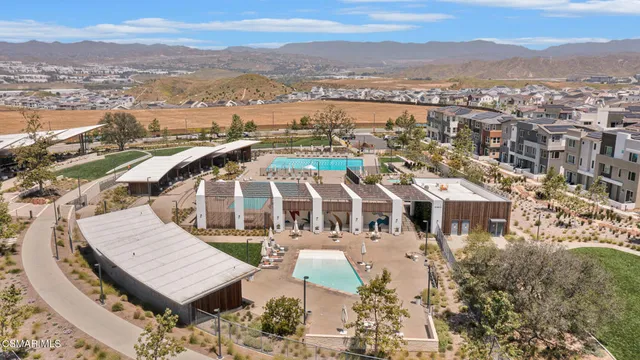 aerial view of a house with a yard