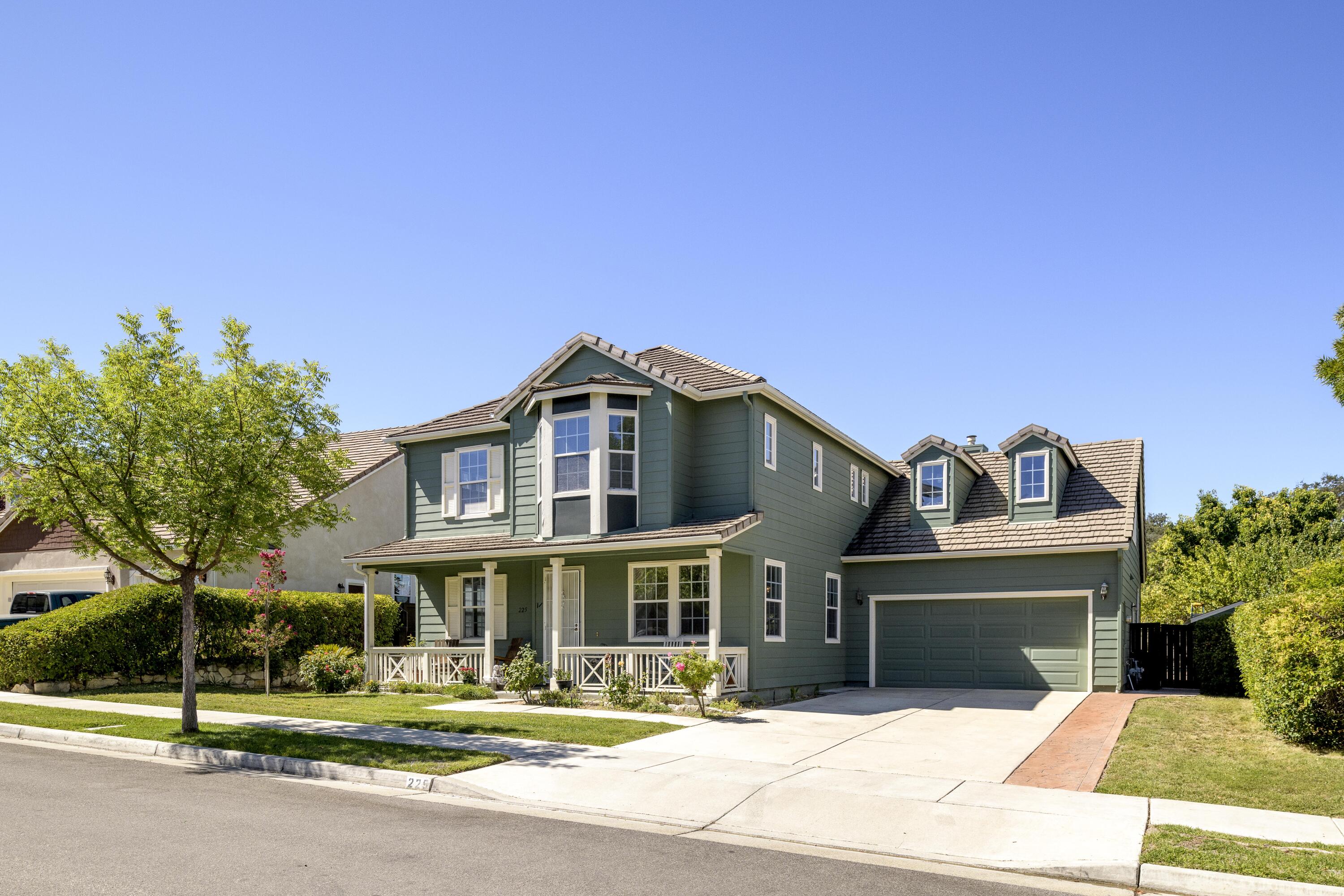 a front view of a house with a porch