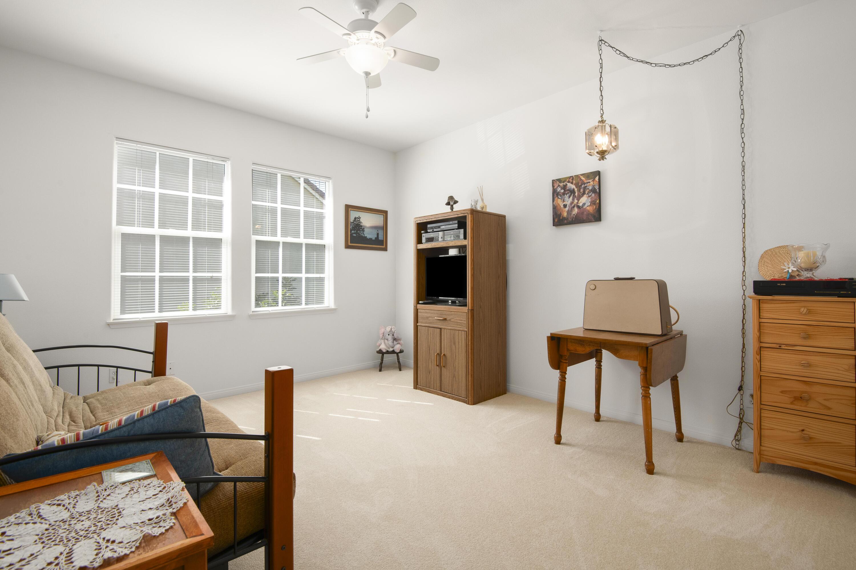 225 Silver Oak Drive Paso Robles, CA 93446 - Photo 14 of 22 a bedroom with furniture and a window