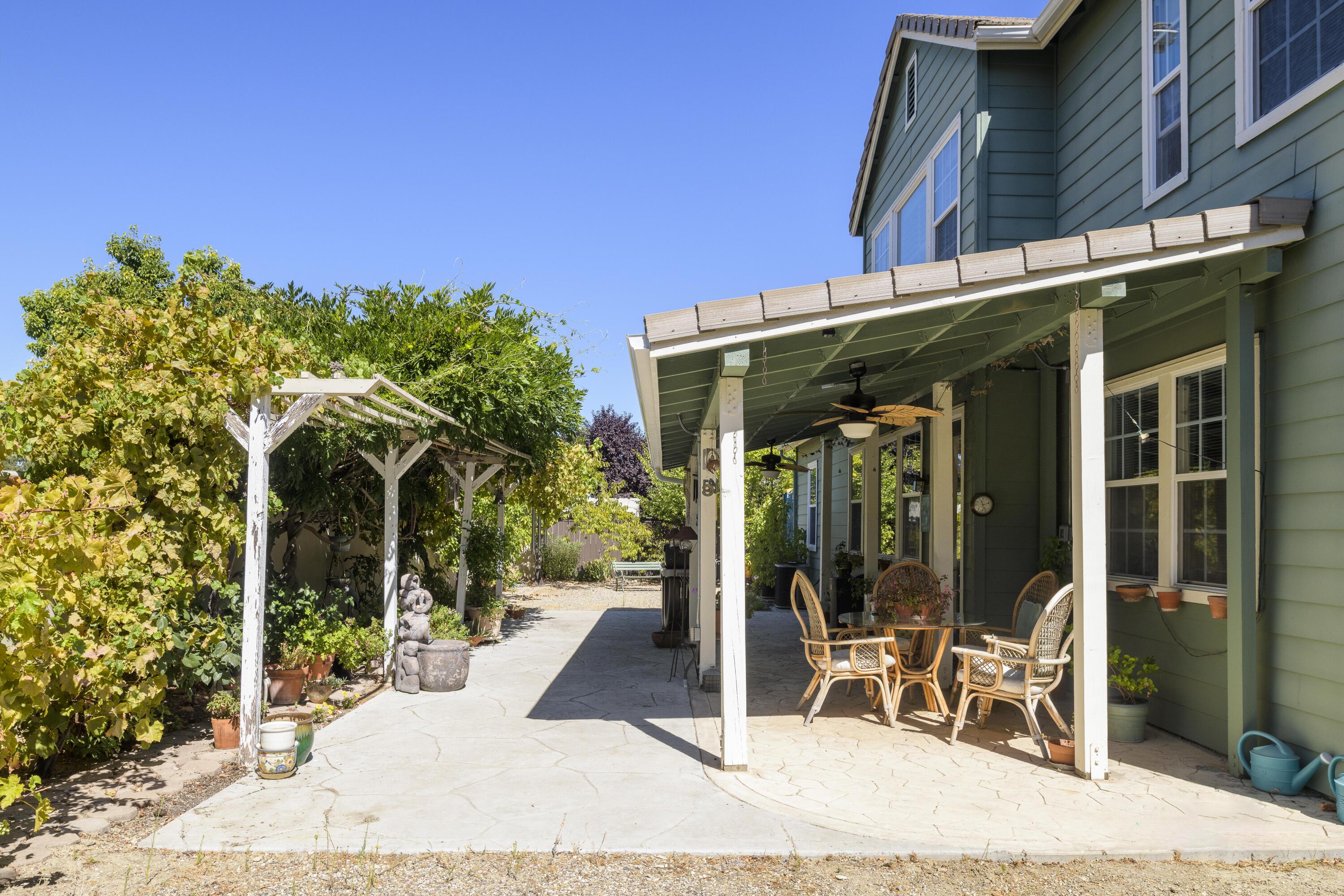 225 Silver Oak Drive Paso Robles, CA 93446 - Photo 21 of 22 a front view of a building with garden