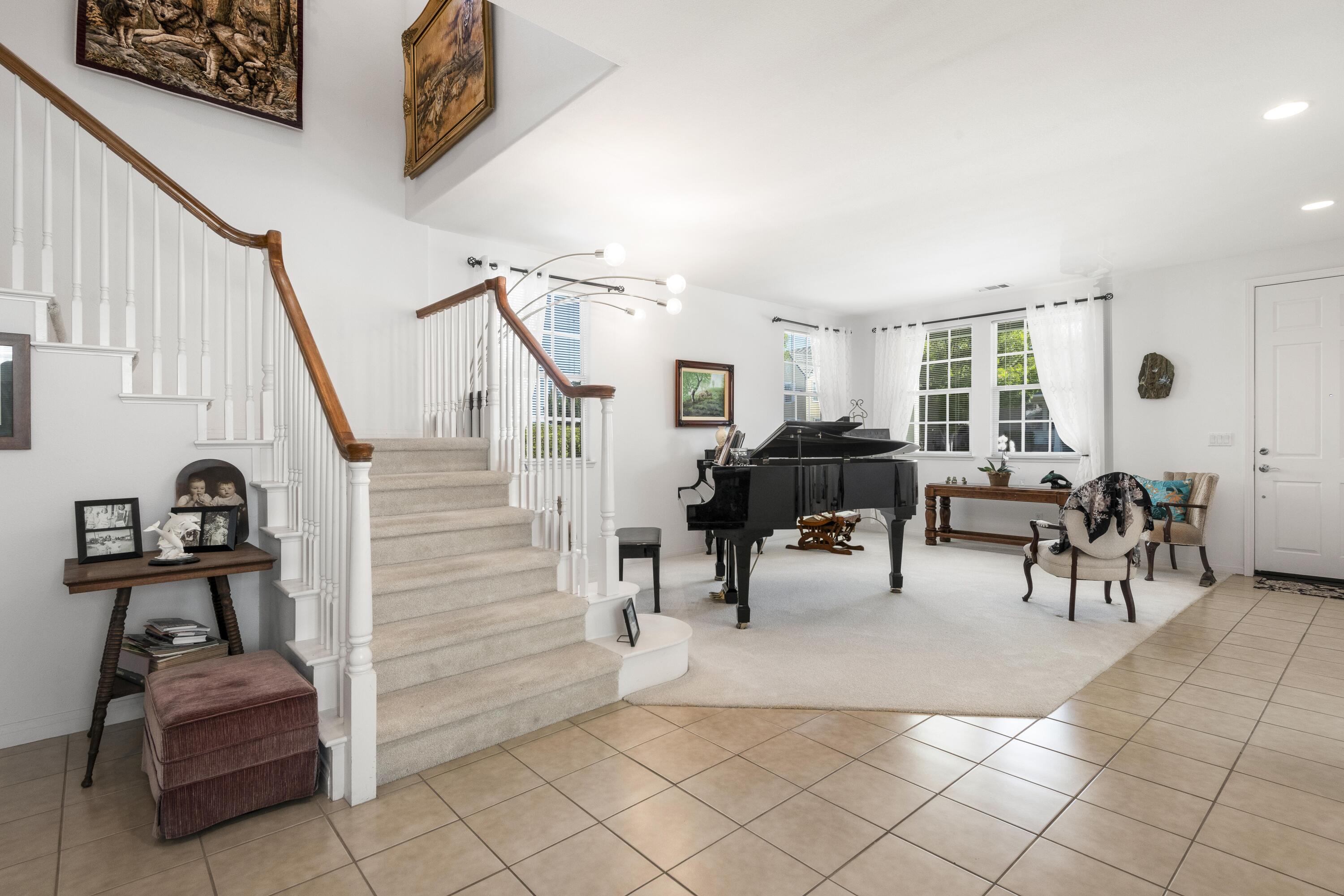 225 Silver Oak Drive Paso Robles, CA 93446 - Photo 7 of 22 a living room with furniture and white walls