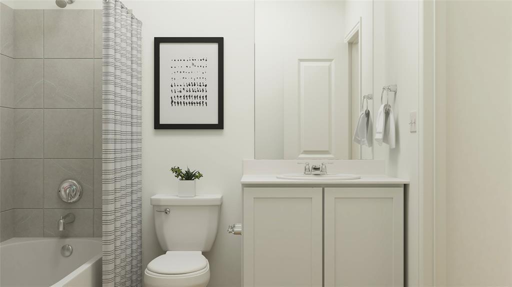 227 Jenkinson Drive Fate, TX 75189 - Photo 16 of 17 a bathroom with a sink a toilet and shower
