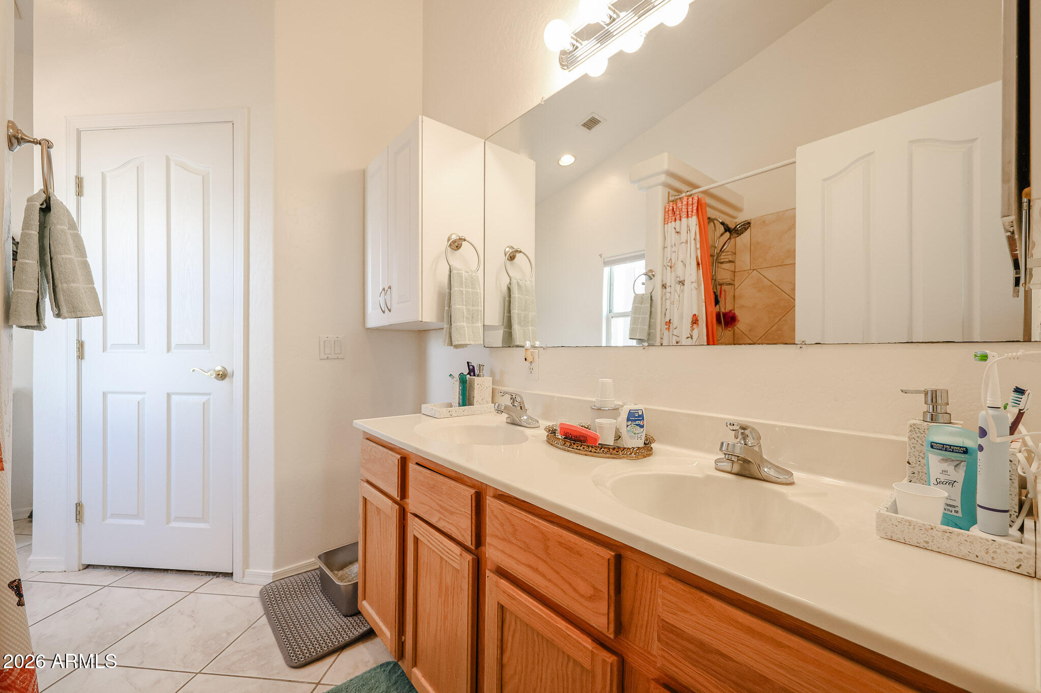 14980 South Capistrano Road Arizona City, AZ 85123 - Photo 16 of 39 a bathroom with a sink and a mirror
