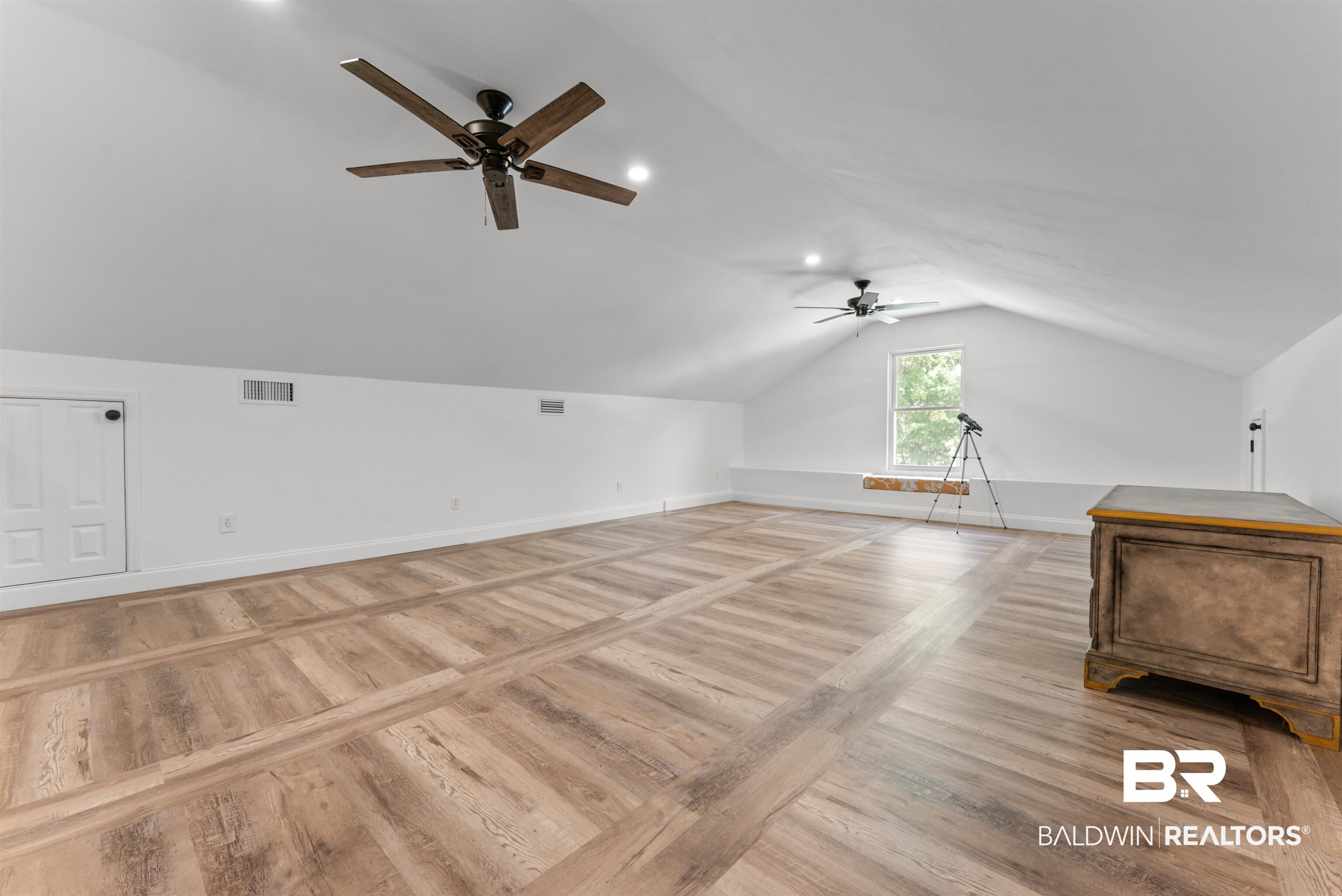 6447 Bemis Lane Bon Secour, AL 36511 - Photo 40 of 62 Spacious attic room with vaulted ceilings and recessed lighting