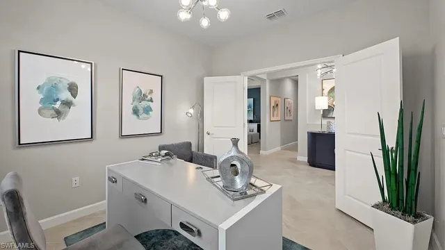 a bathroom with a sink mirror and a shower
