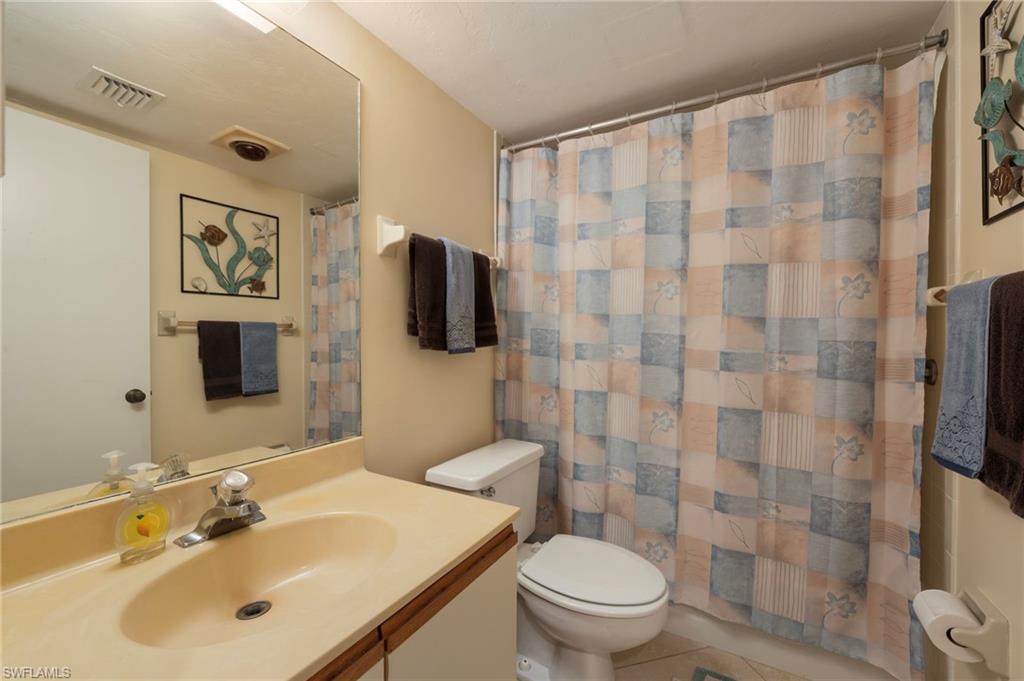1231 Commonwealth Circle, Unit Q103 Naples, FL 34116 - Photo 13 of 22 Secondary bathroom