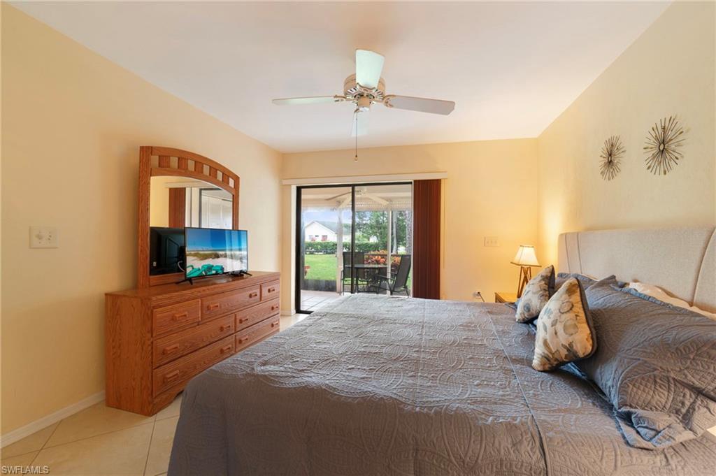 1231 Commonwealth Circle, Unit Q103 Naples, FL 34116 - Photo 16 of 22 Owner's bedroom with slider access to lanai