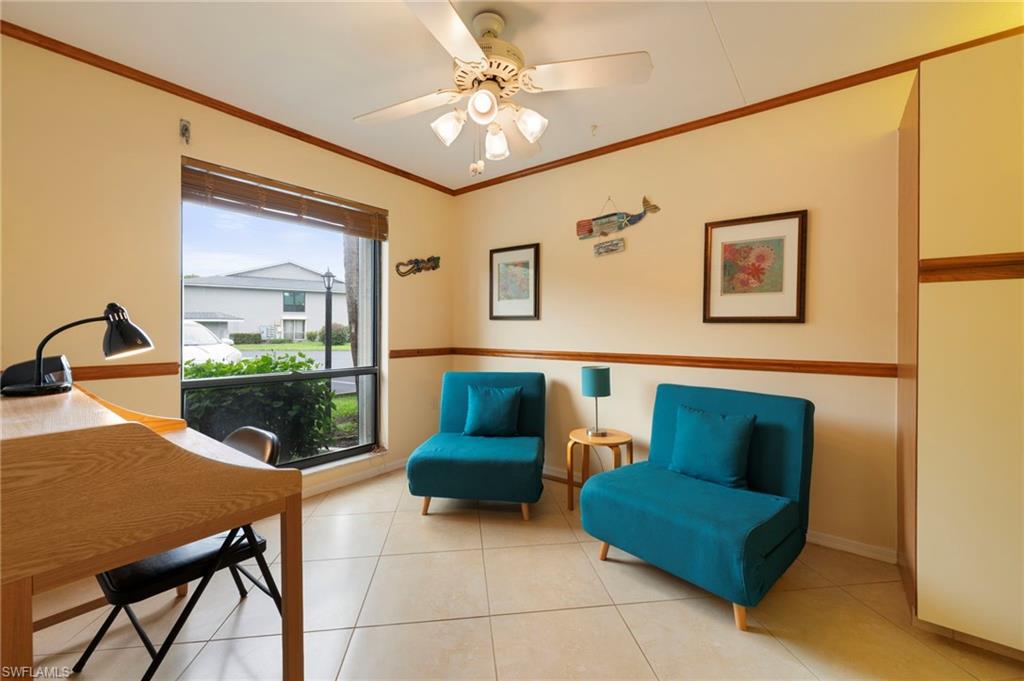 1231 Commonwealth Circle, Unit Q103 Naples, FL 34116 - Photo 3 of 22 Breakfast nook currently being used as a den area