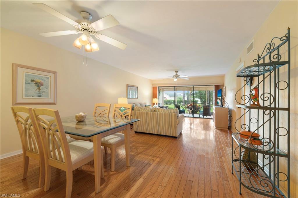 1231 Commonwealth Circle, Unit Q103 Naples, FL 34116 - Photo 9 of 22 Dining-Living area with ceiling fans