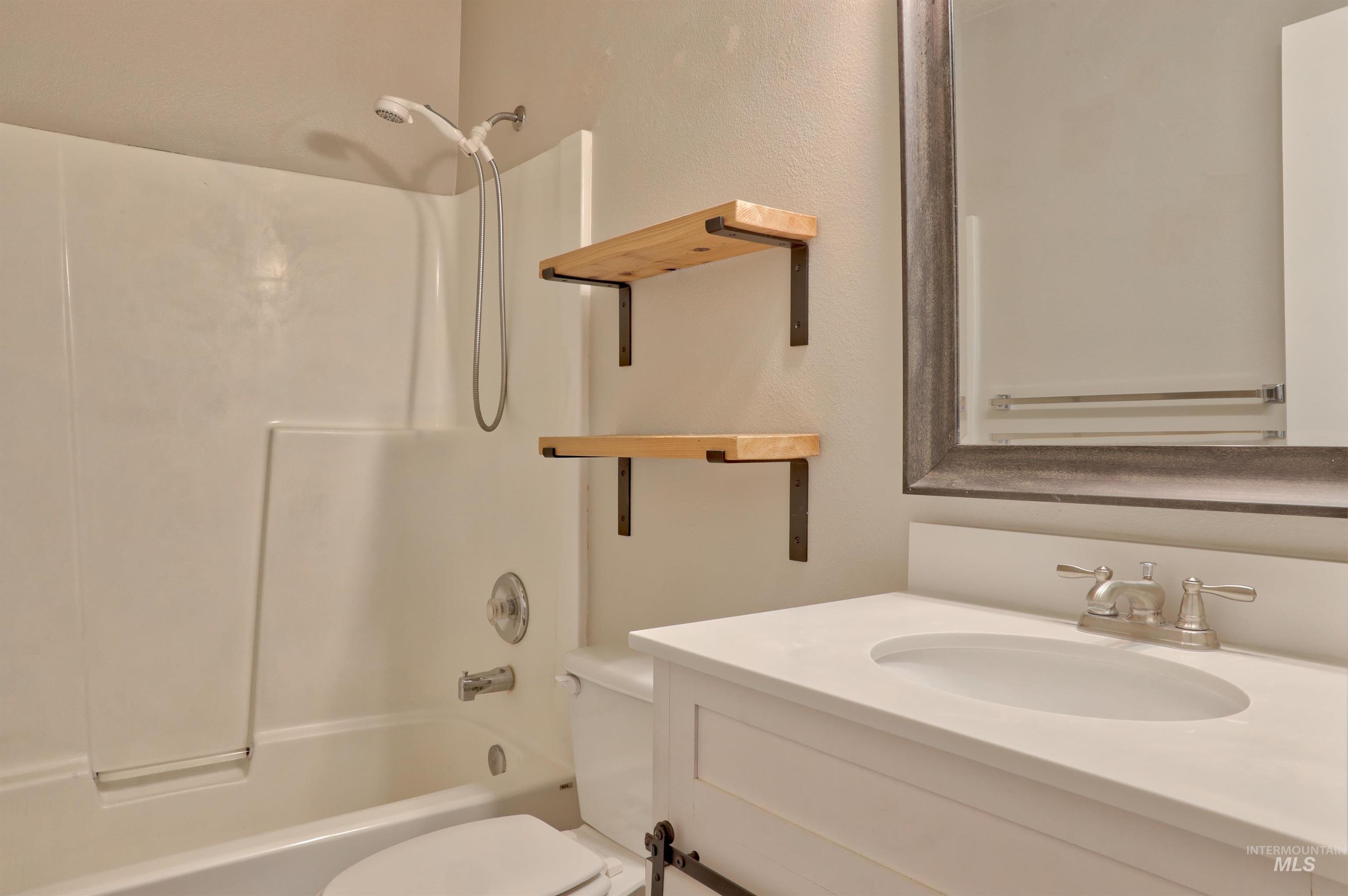 4911 Buffalo Grass Avenue Caldwell, ID 83607 - Photo 9 of 15 Full bath featuring bathing tub / shower combination and vanity