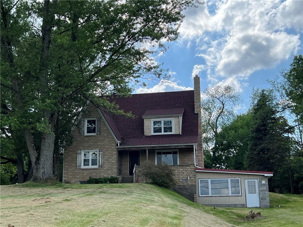 368 Pittsburgh Road Butler, PA 16002 - Photo 1 of 26 a front view of a house with garden
