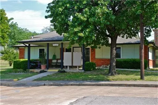front view of a house and a yard