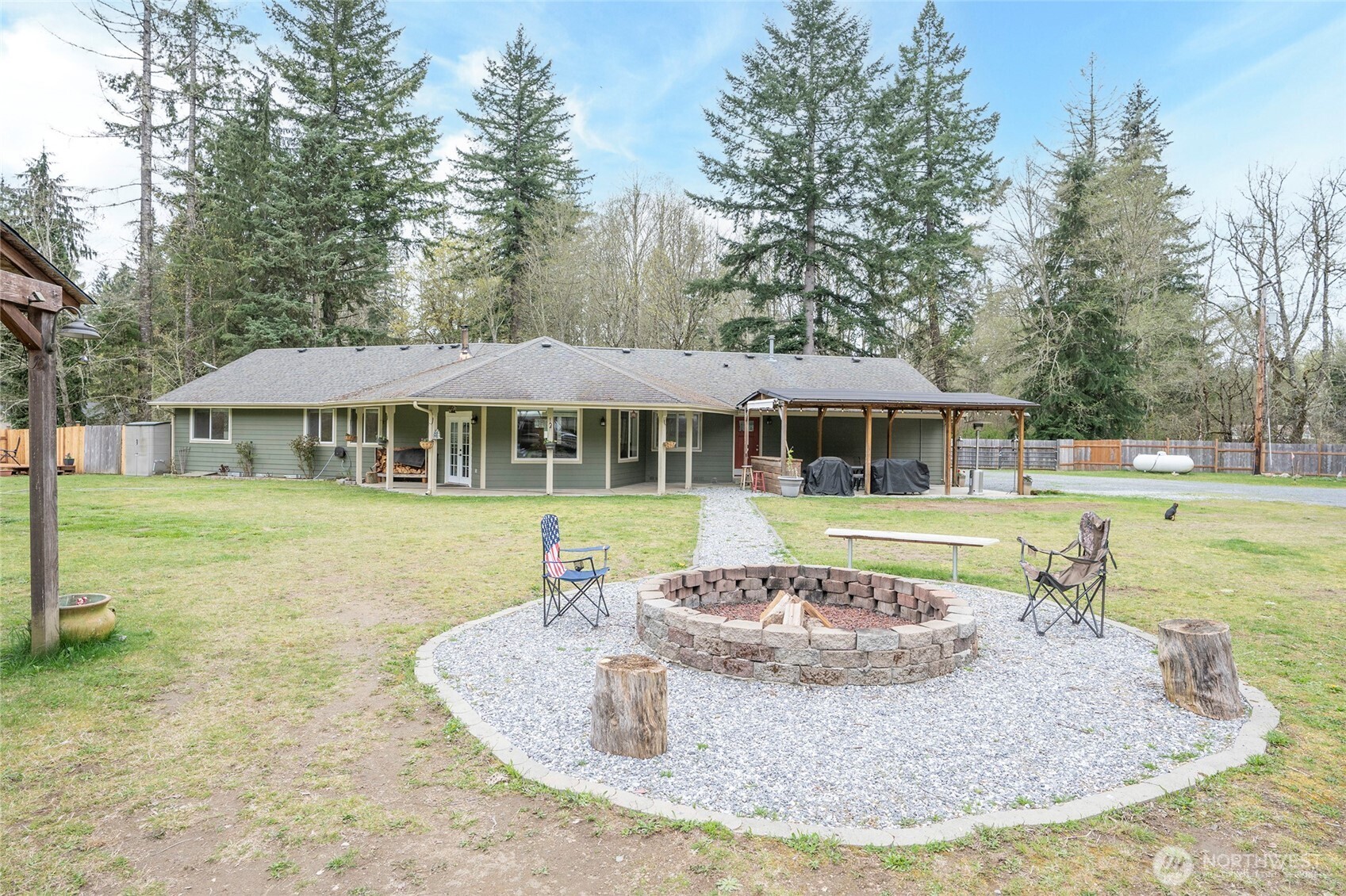 20108 Highway 706 Elbe, WA 98330 - Photo 1 of 37 a view of a house with swimming pool and a yard
