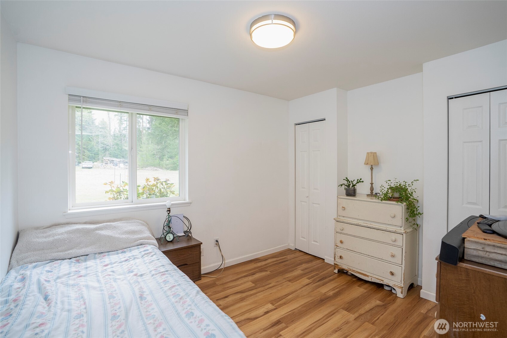 20108 Highway 706 Elbe, WA 98330 - Photo 16 of 37 a bedroom with a bed and a window