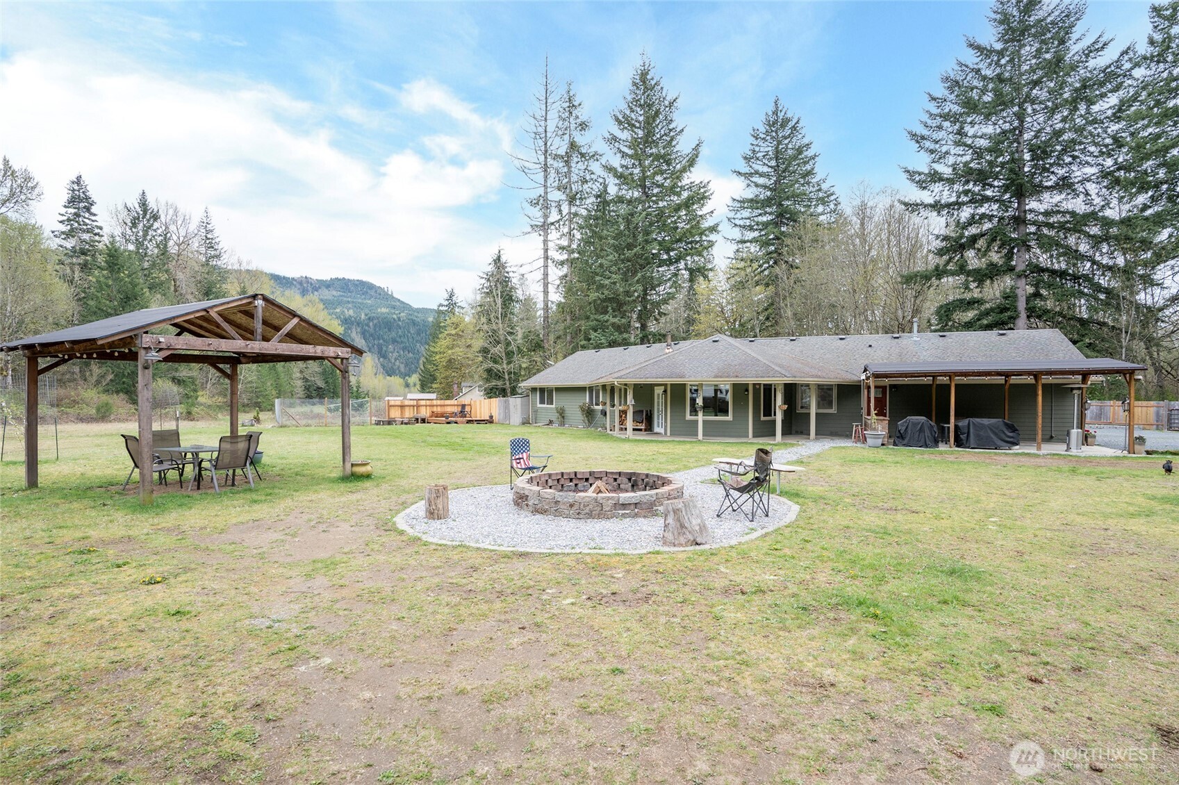 20108 Highway 706 Elbe, WA 98330 - Photo 2 of 37 a front view of a house with garden