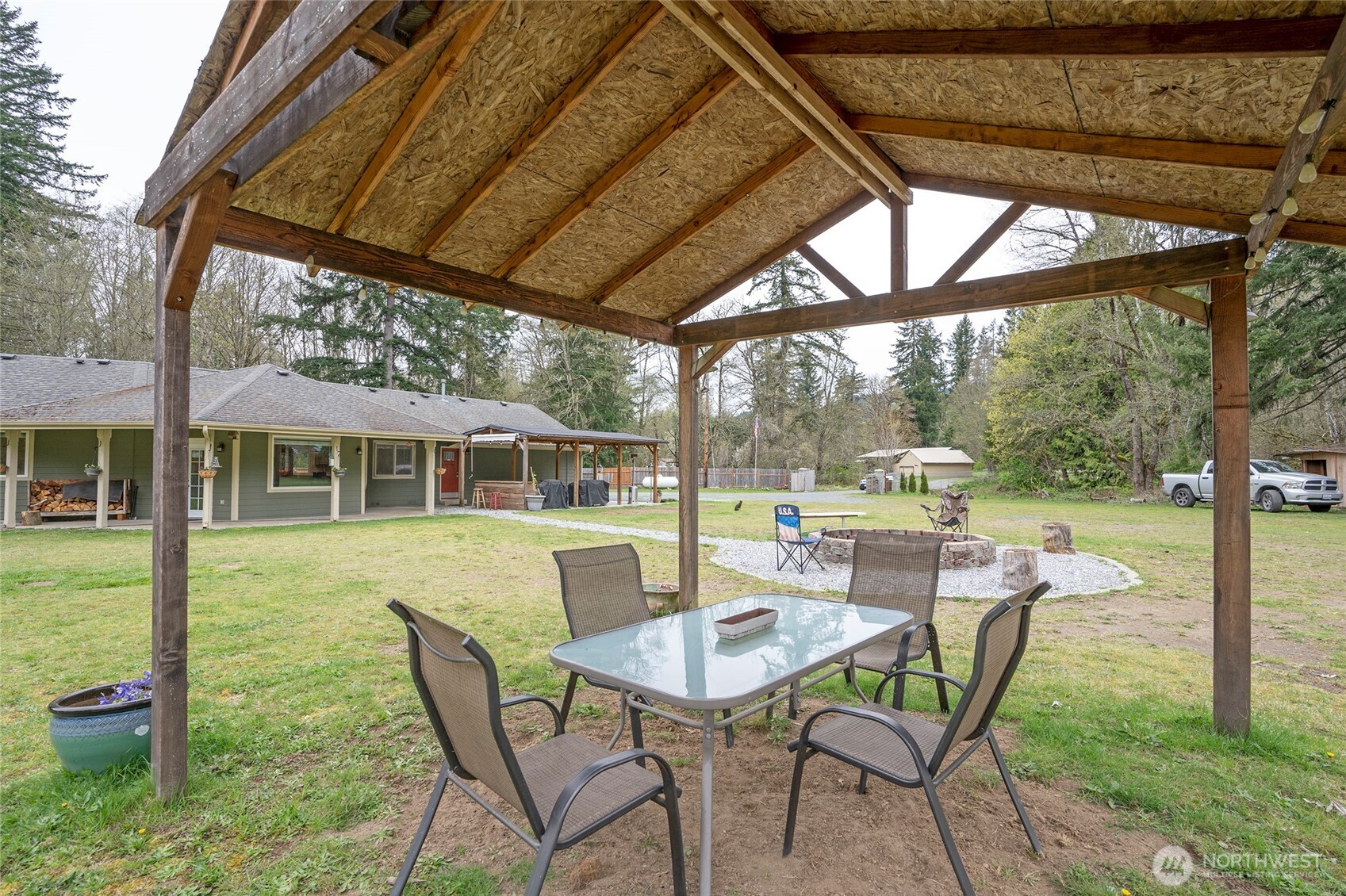20108 Highway 706 Elbe, WA 98330 - Photo 31 of 37 a view of an house with backyard and porch