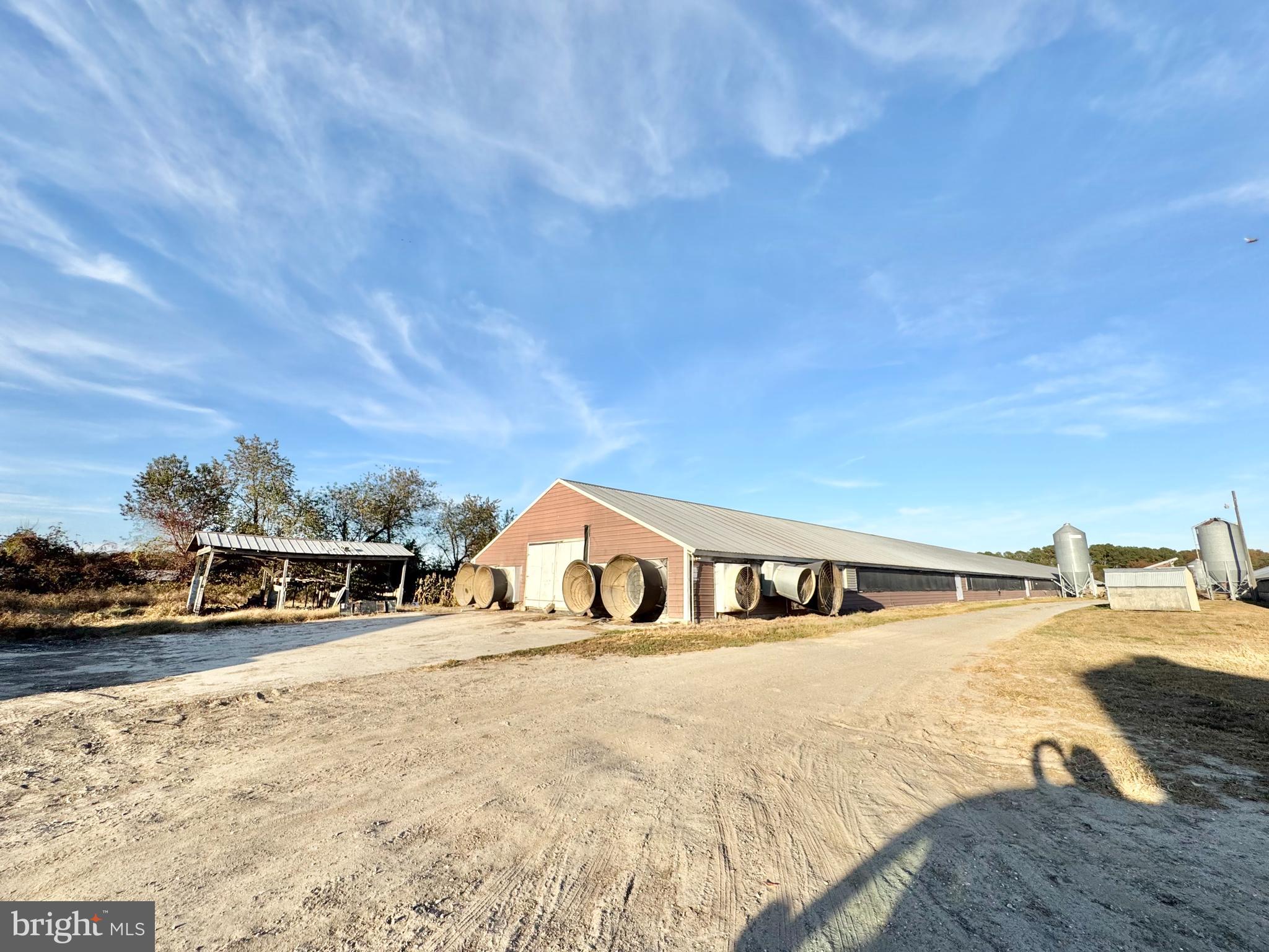 31568 Mt Pleasant Road Laurel, DE 19956 - Photo 2 of 30 a view of houses with outdoor space