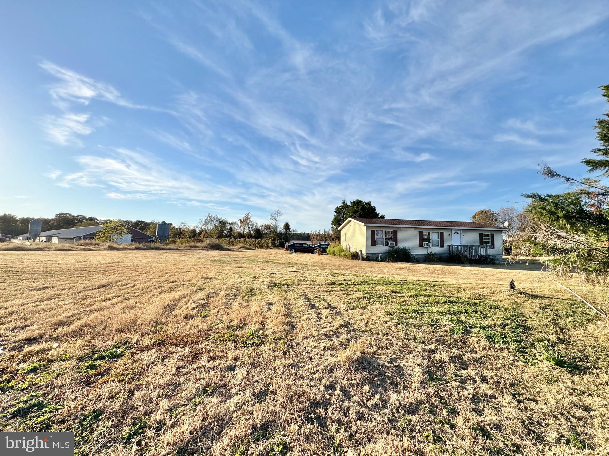 31568 Mt Pleasant Road Laurel, DE 19956 - Photo 28 of 30 a view of a large body of water with a building in the background