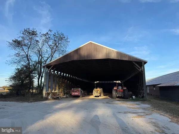 a view of a car parked in front of a house