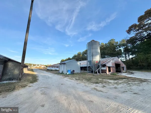 a view of a house with roof deck and flat screen tv