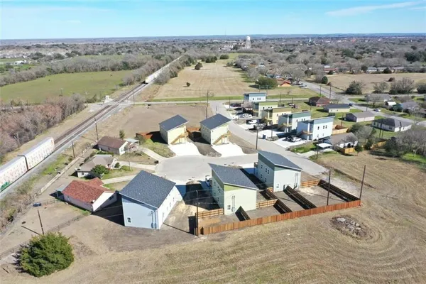 an aerial view of a house with a outdoor space