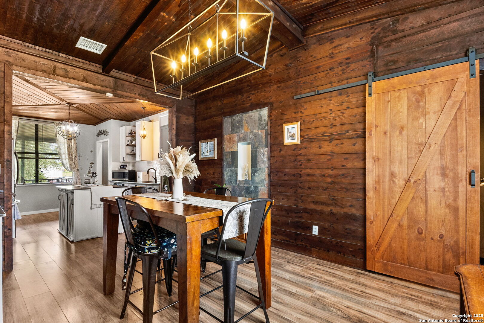 114 Avenue B Converse, TX 78109 - Photo 14 of 26 a dining room with furniture and wooden floor