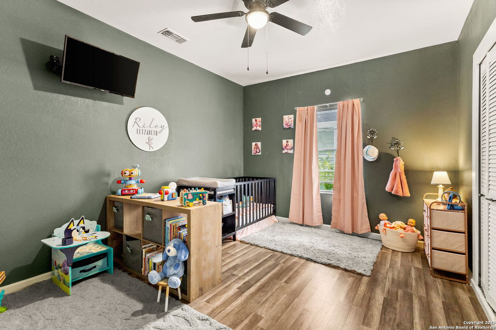 114 Avenue B Converse, TX 78109 - Photo 20 of 26 a very nice looking room with a wooden floor