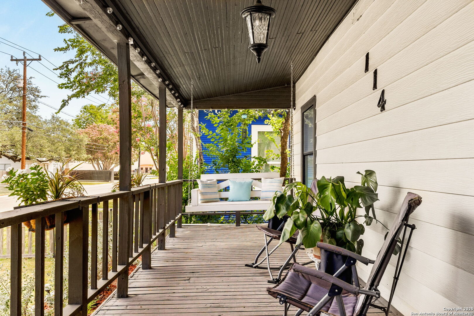 114 Avenue B Converse, TX 78109 - Photo 5 of 26 a balcony with furniture and a potted plant