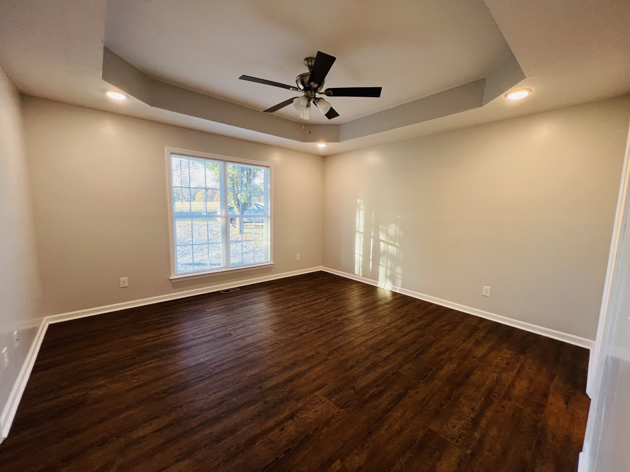 60 Myrick Road Flintville, TN 37335 - Photo 18 of 32 a view of empty room with wooden floor and fan