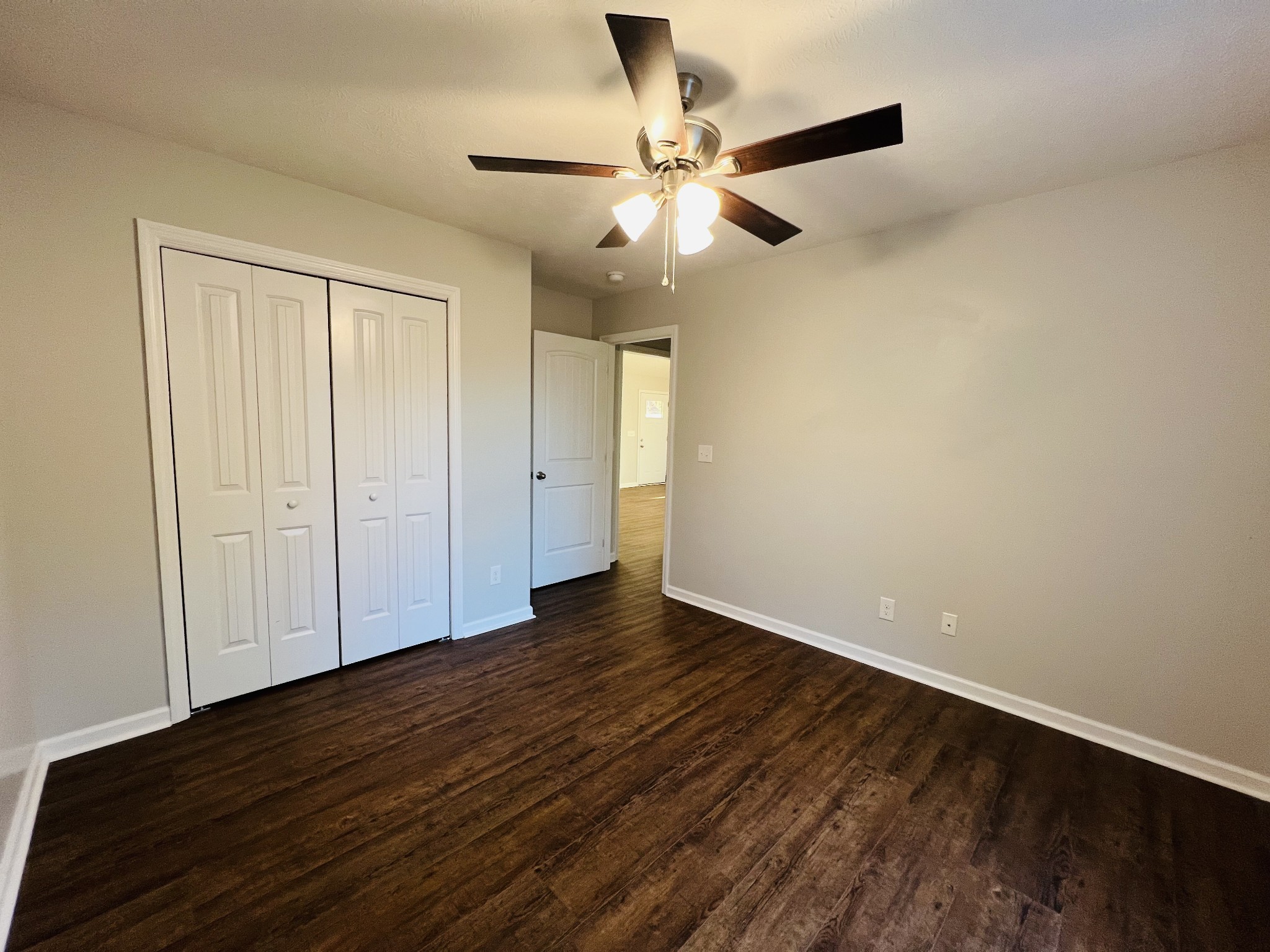 60 Myrick Road Flintville, TN 37335 - Photo 23 of 32 a view of an empty room with wooden floor