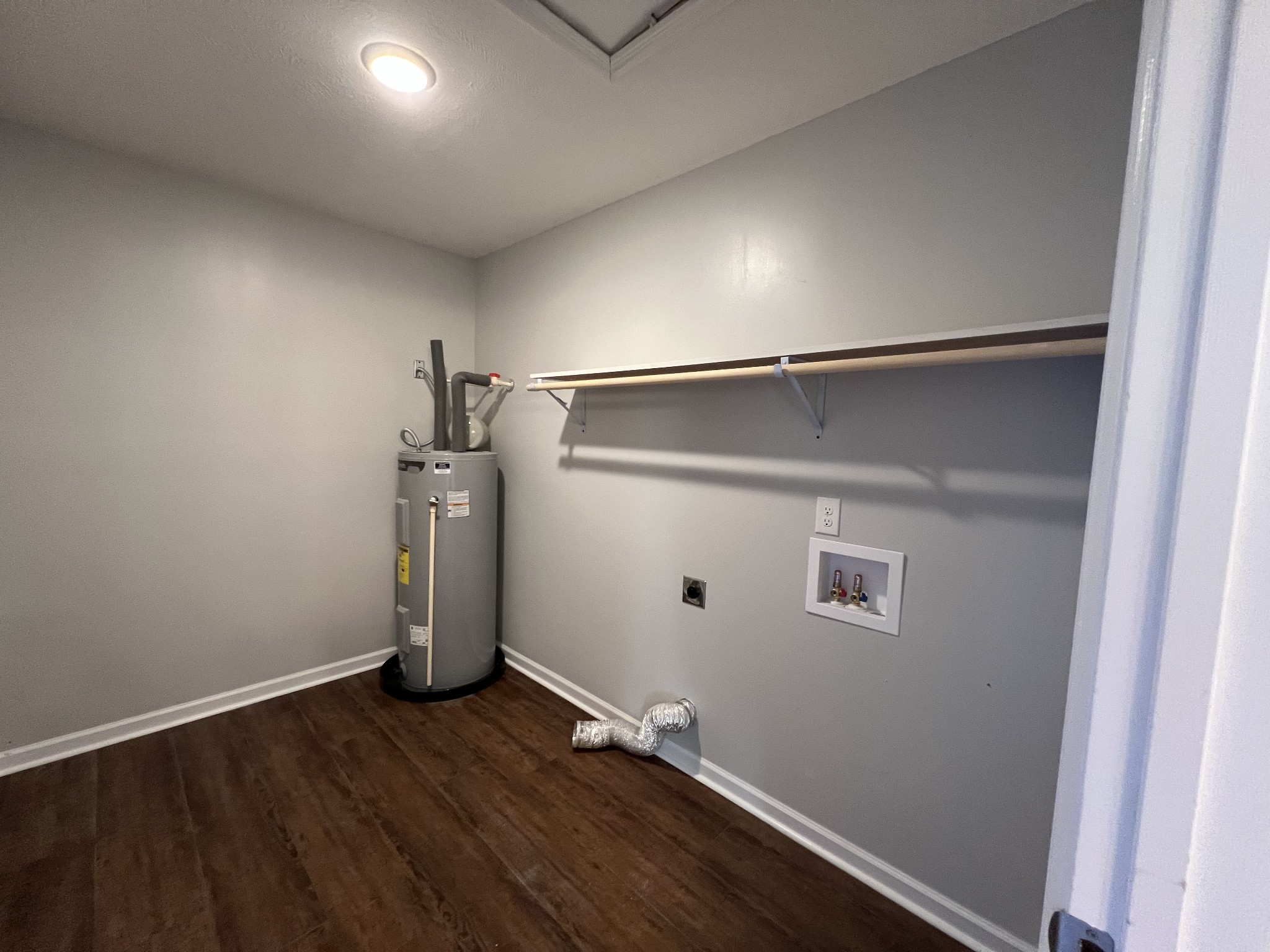 60 Myrick Road Flintville, TN 37335 - Photo 30 of 32 an empty room with wooden floor and windows