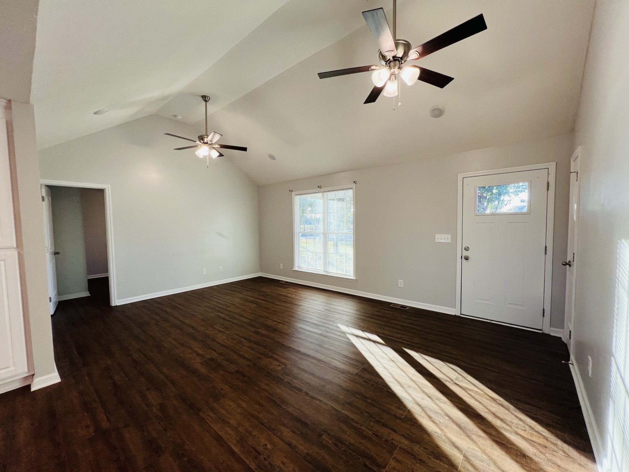 60 Myrick Road Flintville, TN 37335 - Photo 10 of 32 wooden floor in an empty room with a window