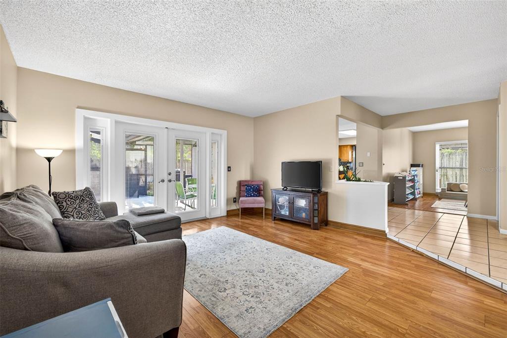 12913 Rain Forest Street Temple Terrace, FL 33617 - Photo 13 of 63 a living room with furniture and a flat screen tv