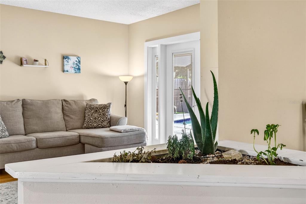 12913 Rain Forest Street Temple Terrace, FL 33617 - Photo 16 of 63 a living room with furniture