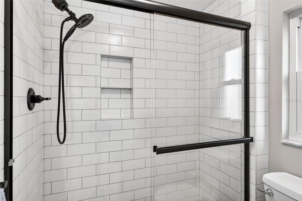 12913 Rain Forest Street Temple Terrace, FL 33617 - Photo 50 of 63 a bathroom with a shower
