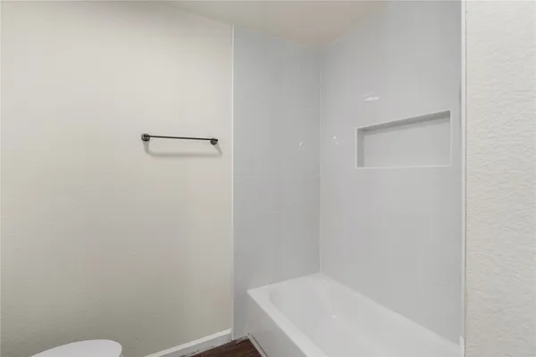 a bathroom with a bathtub