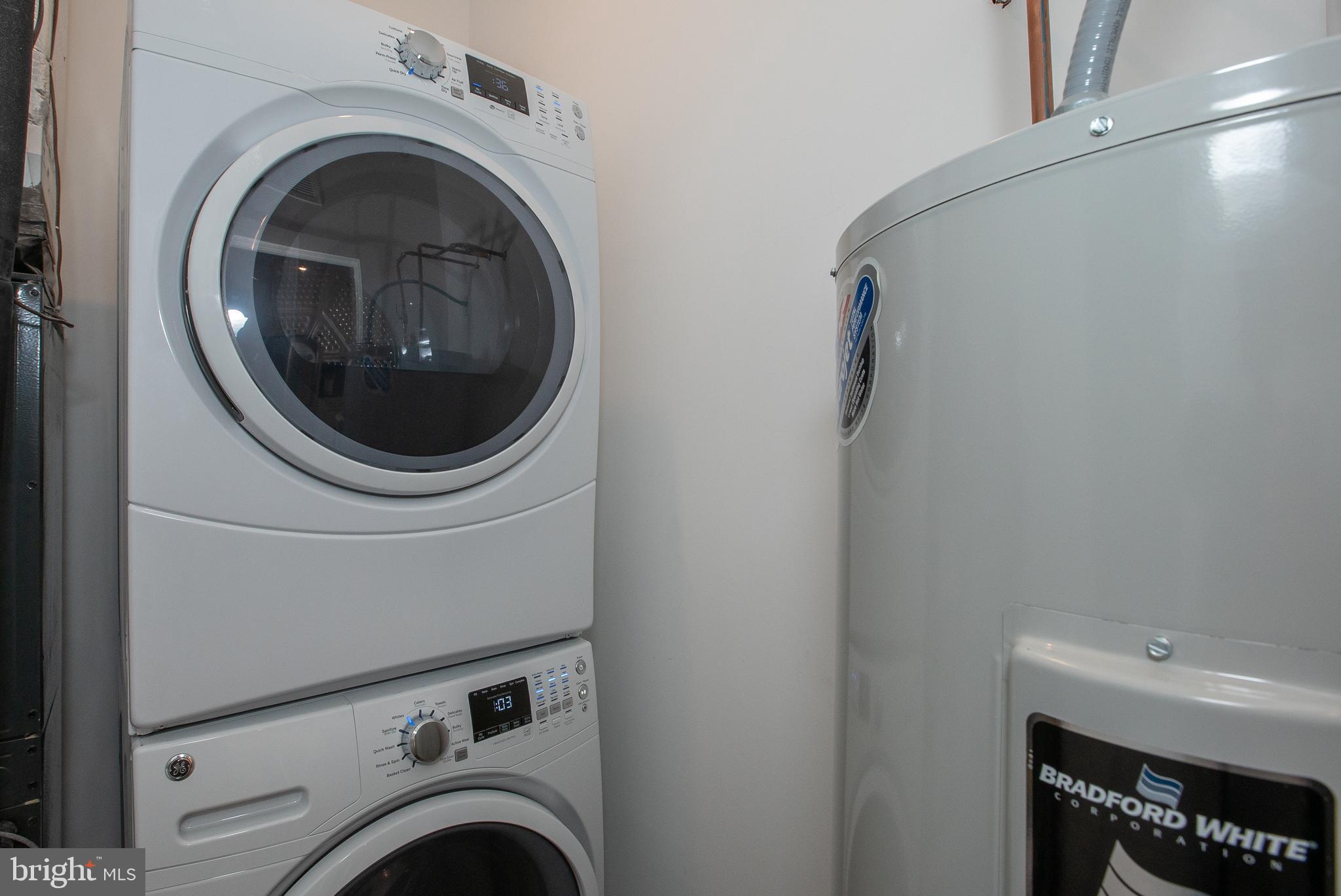 2940 West Thompson Street, Unit 305 Philadelphia, PA 19121 - Photo 16 of 24 a utility room with dryer and washer
