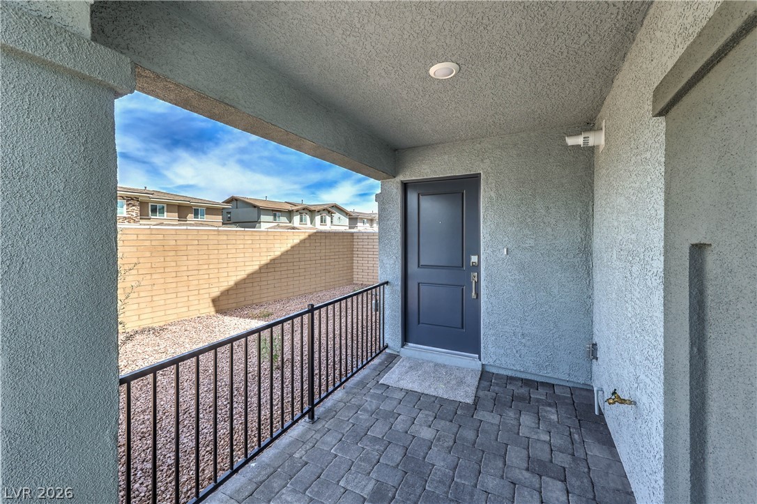 776 Fallen Phoenix Street Henderson, NV 89011 - Photo 2 of 30 Gated Courtyard Entry and Paver Driveway and Walkway