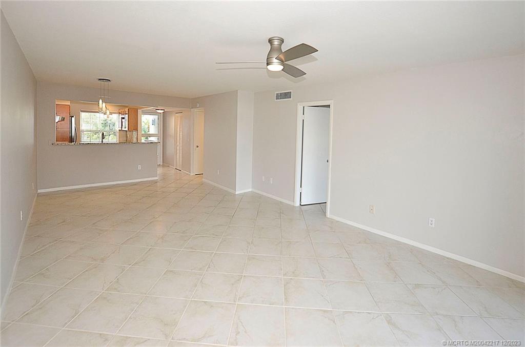 1866 Southwest Palm City Road, Unit 302 Stuart, FL 34994 - Photo 21 of 30 a view of an empty room with a window