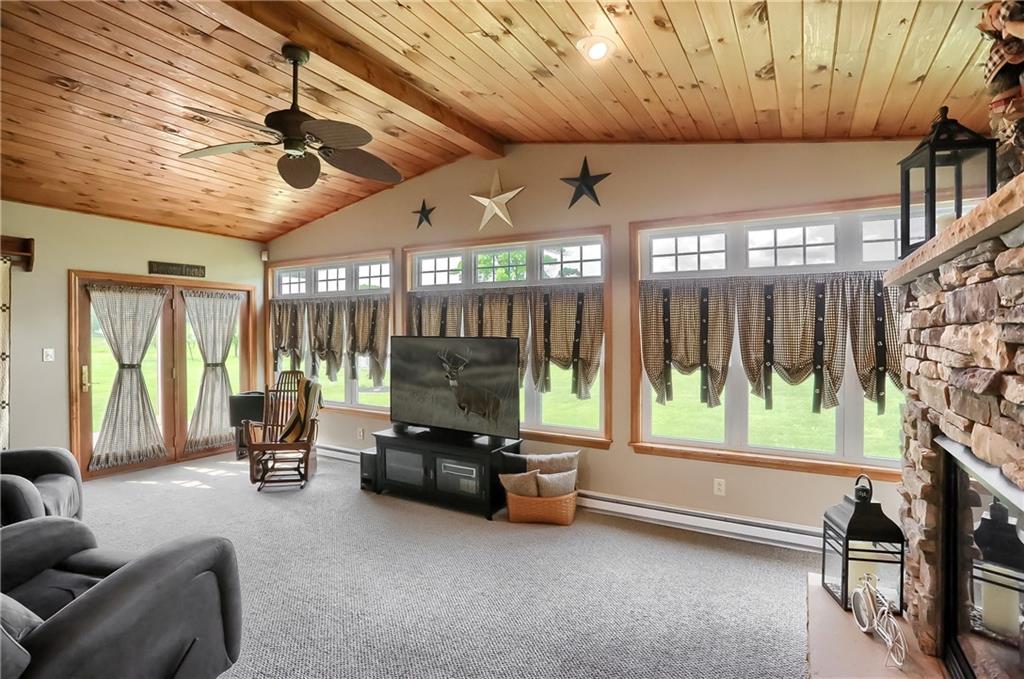 287 Holyoke Road Butler, PA 16001 - Photo 14 of 35 a living room with patio furniture and a large window