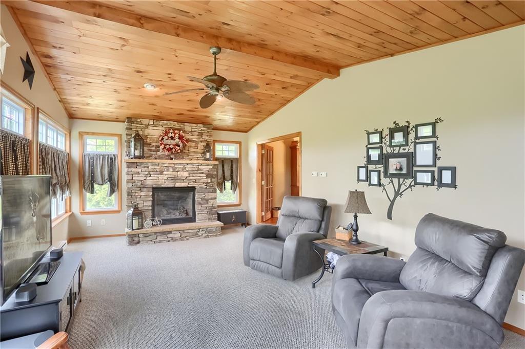 287 Holyoke Road Butler, PA 16001 - Photo 15 of 35 a living room with furniture and a fireplace