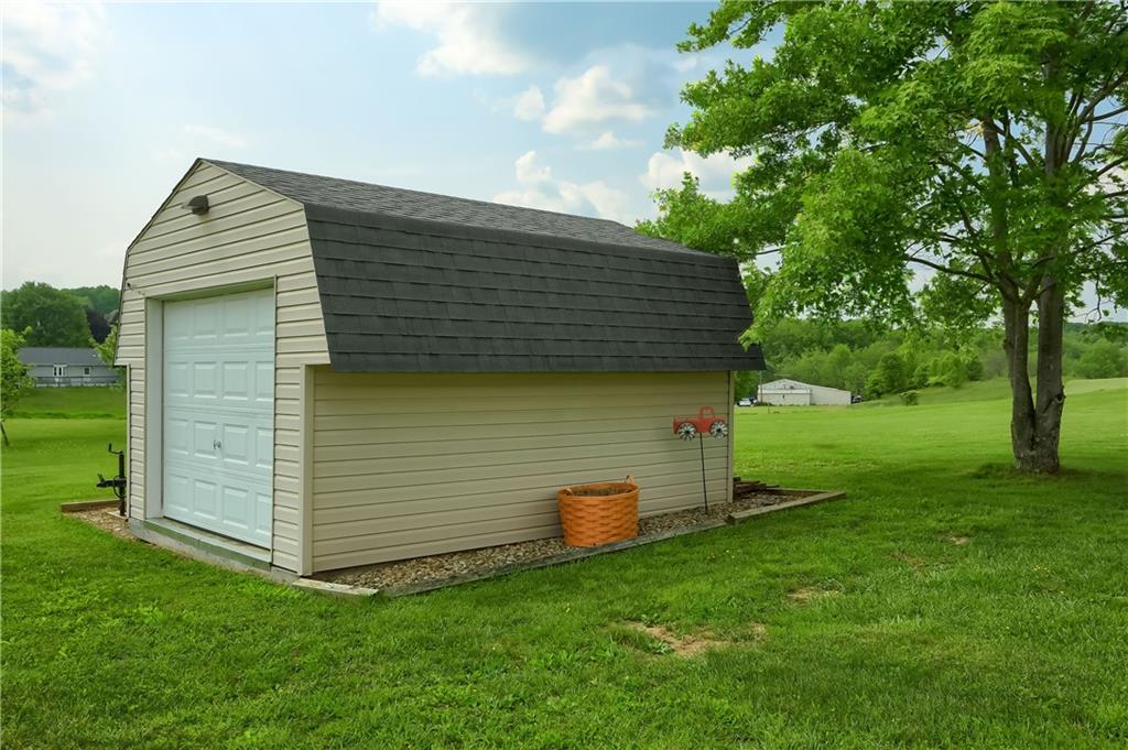 287 Holyoke Road Butler, PA 16001 - Photo 32 of 35 a backyard of a house with lots of green space
