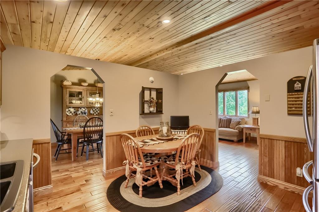 287 Holyoke Road Butler, PA 16001 - Photo 10 of 35 a dining room with furniture window and wooden floor