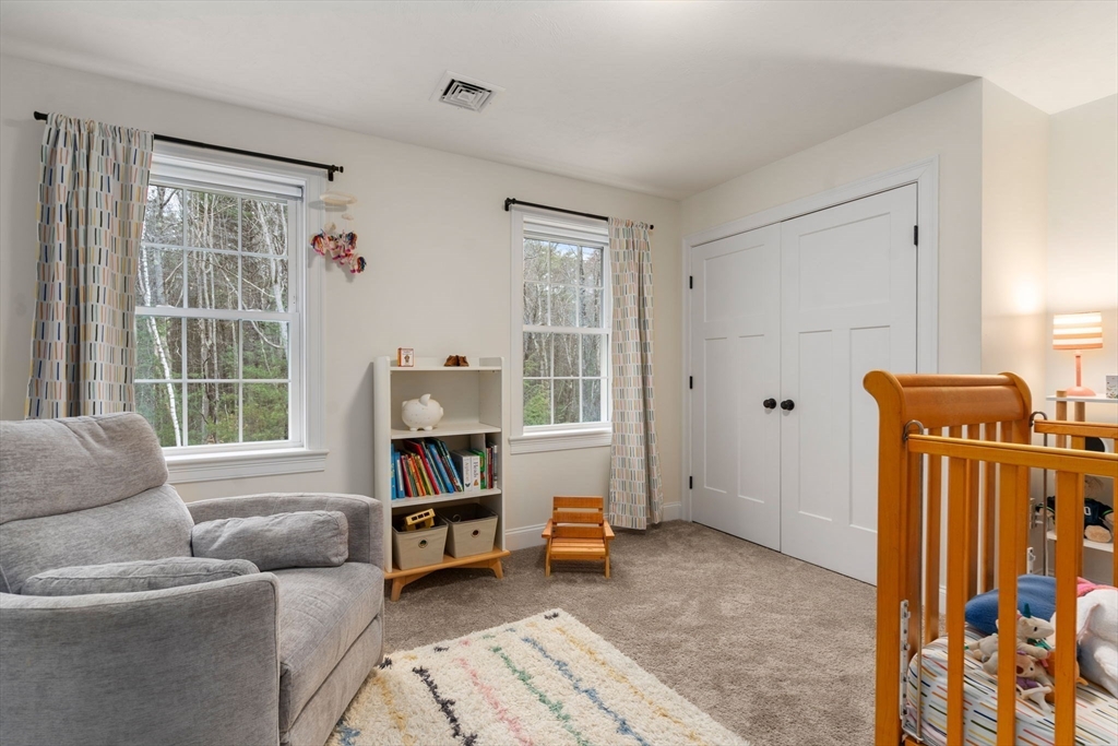 813 Chase Road Lunenburg, MA 01462 - Photo 23 of 41 a living room with furniture and a window