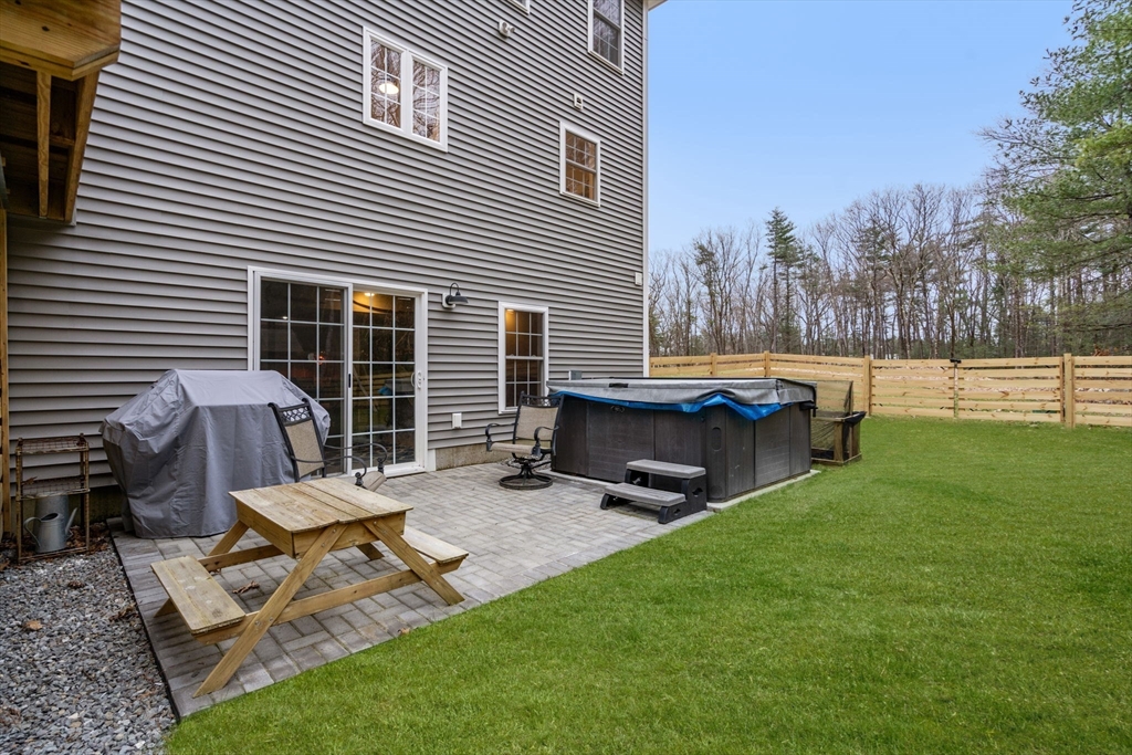 813 Chase Road Lunenburg, MA 01462 - Photo 32 of 41 a view of a house with backyard and sitting area
